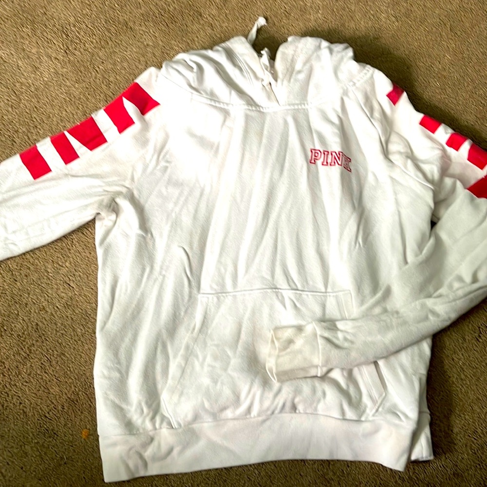 Pink hoodie in good condition slight stain on the chest but hardly noticable